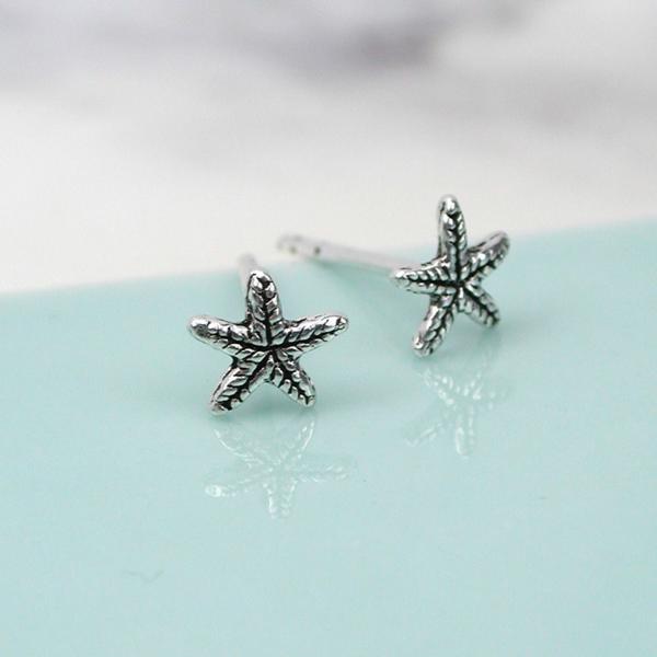 Tiny silver starfish studs