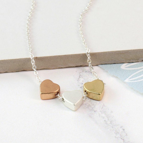 Triple heart mixed finish necklace