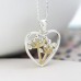 Silver Plated Heart Necklace With Floral Centre