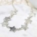 Worn Silver Multi Star Necklace With Crystals