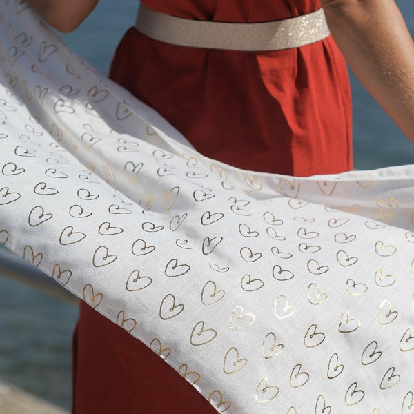 White scarf with gold heart print